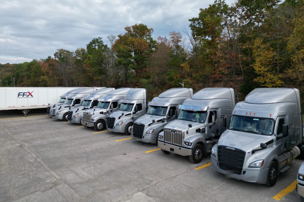 Late-model Freightliner Cascadia and Western Star trucks driven by FFX company drivers